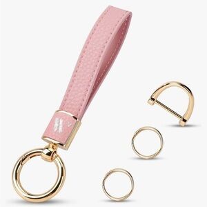 WEESMILE New Keychain with tool. Pink. In original shipping bag.